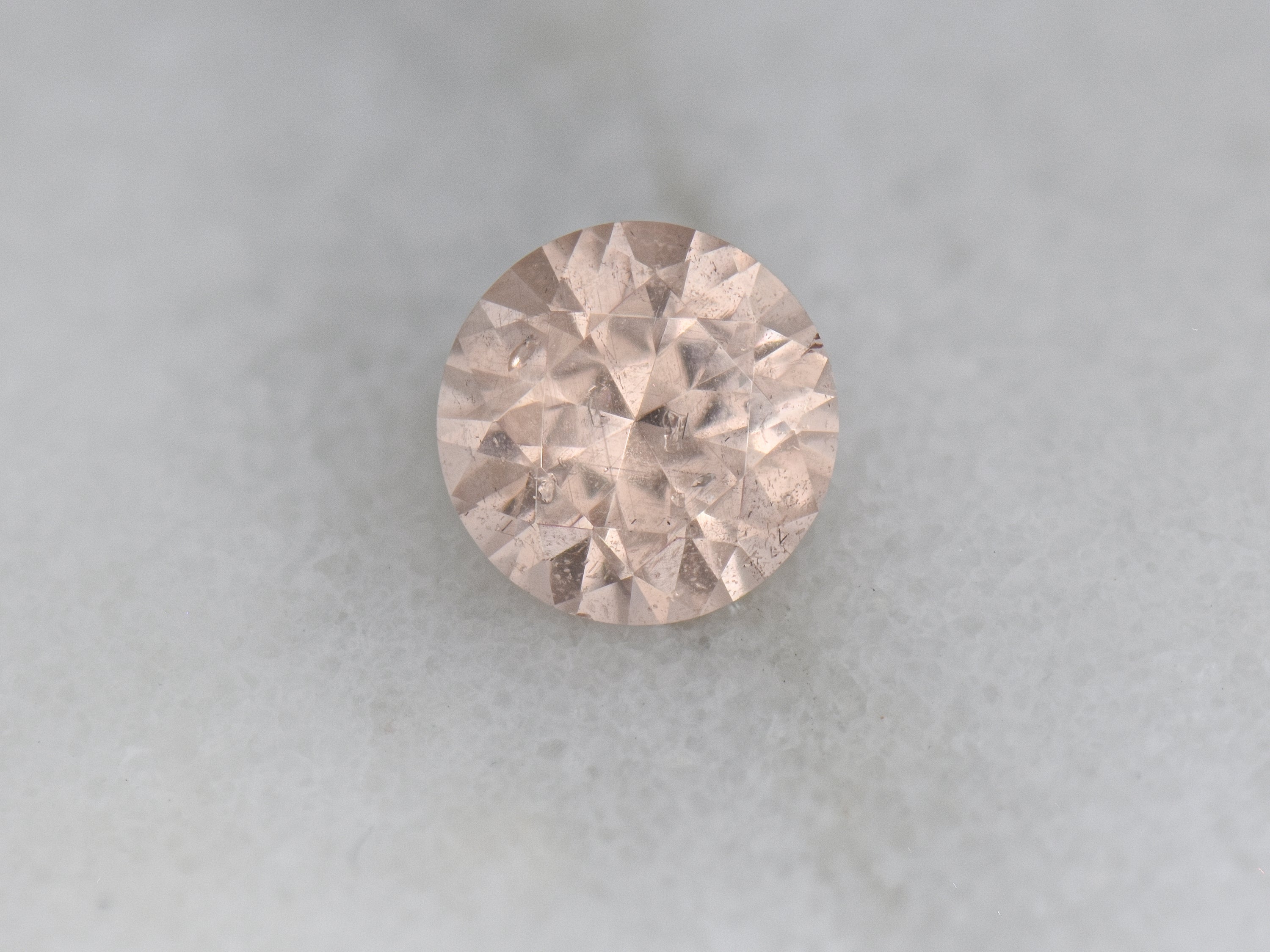 .69 ct. Fluorescent Malaya Garnet