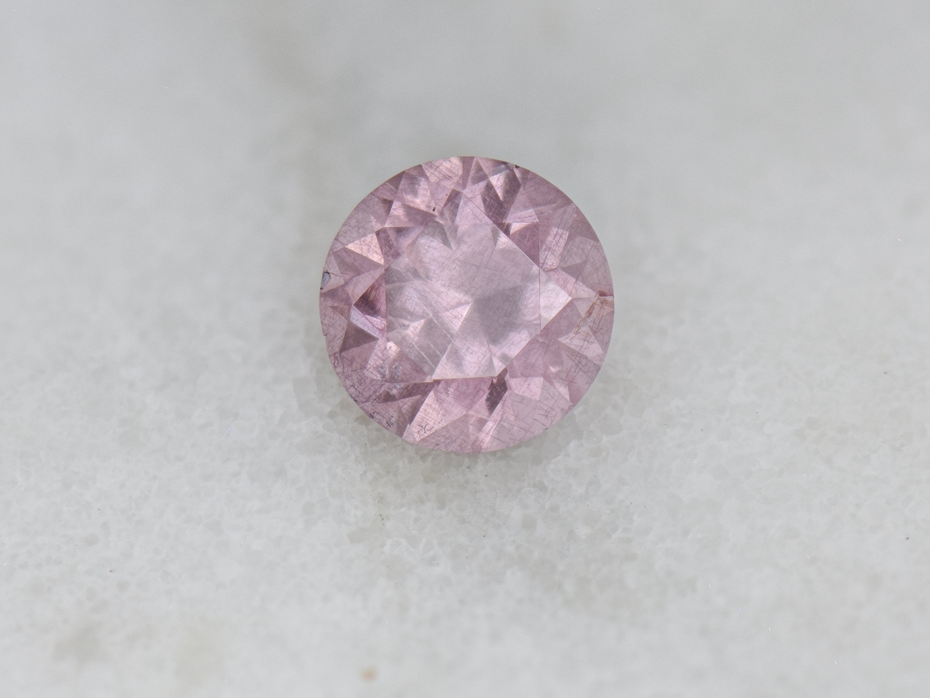 .94 ct. Fluorescent Malaya Garnet