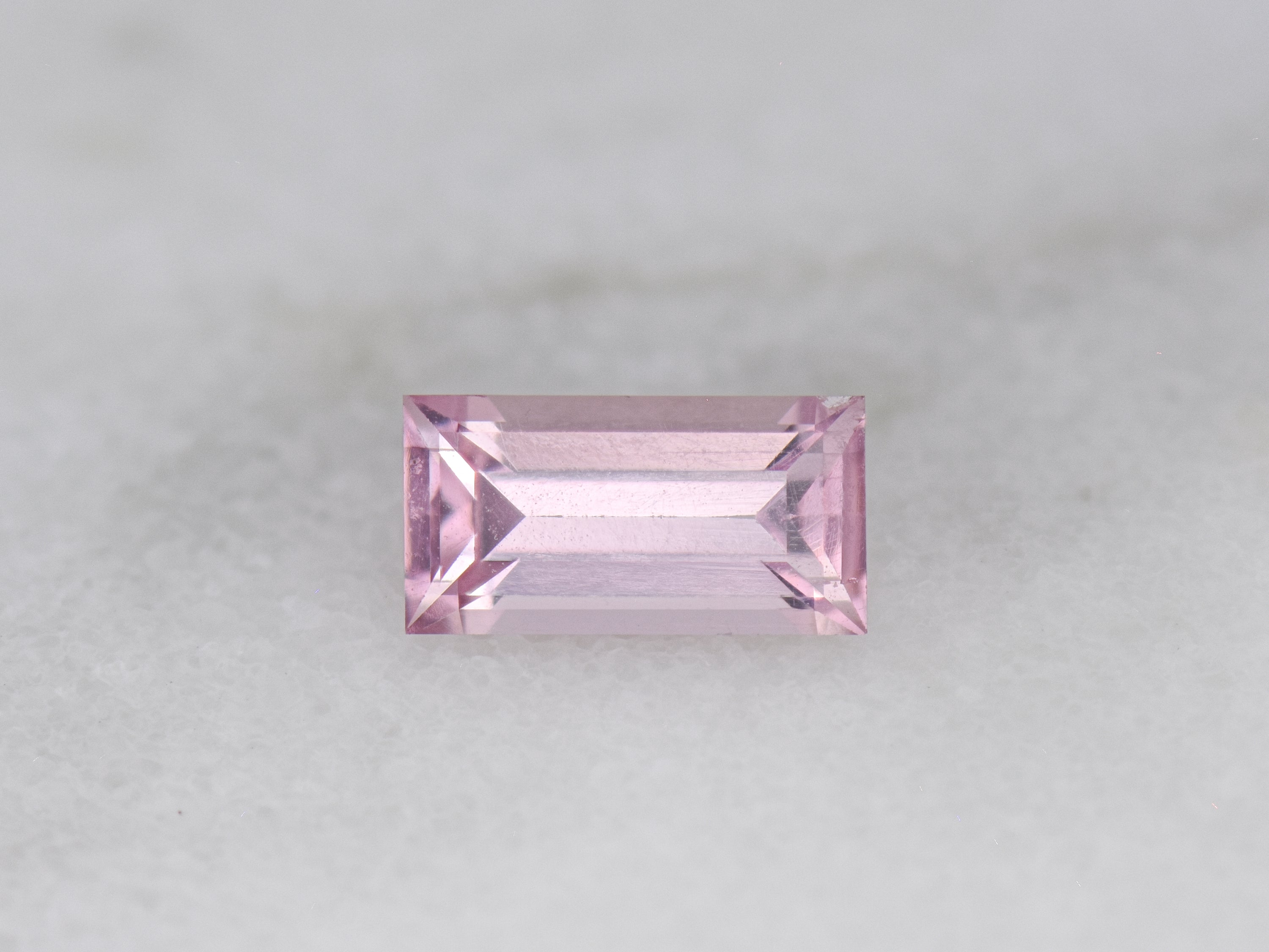 .84 ct. Fluorescent Malaya Garnet