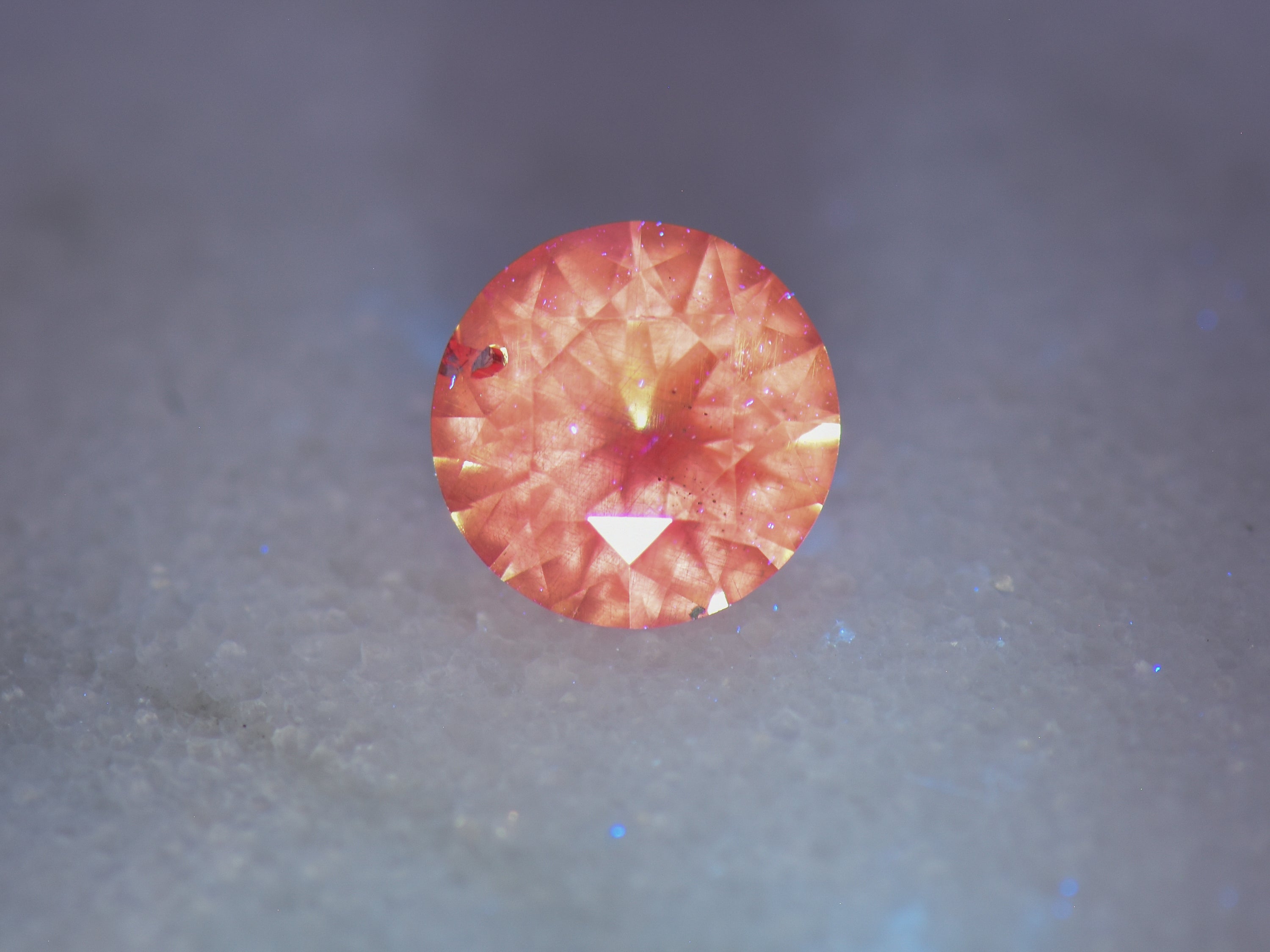 .63 ct. Fluorescent Malaya Garnet