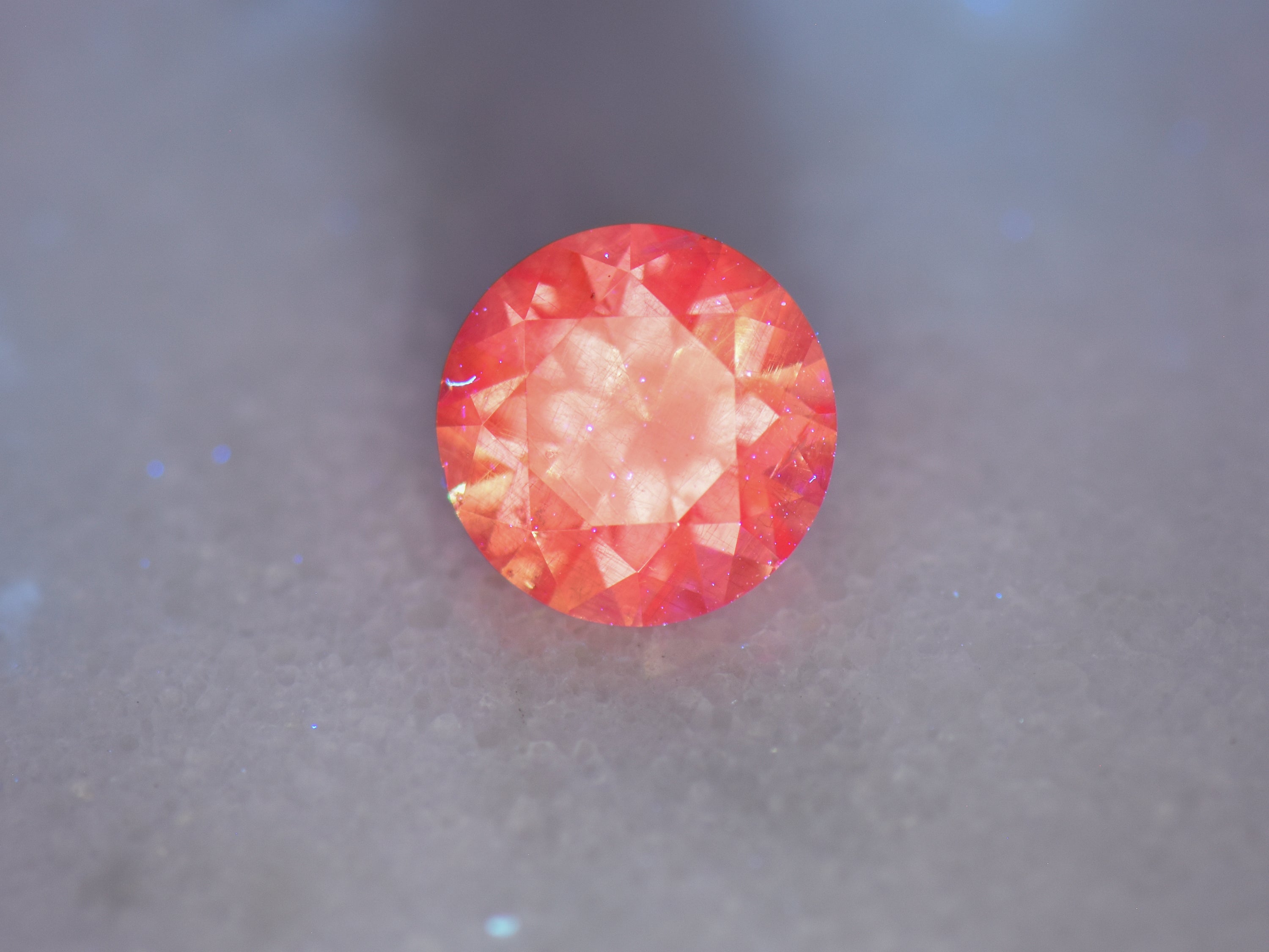 .94 ct. Fluorescent Malaya Garnet