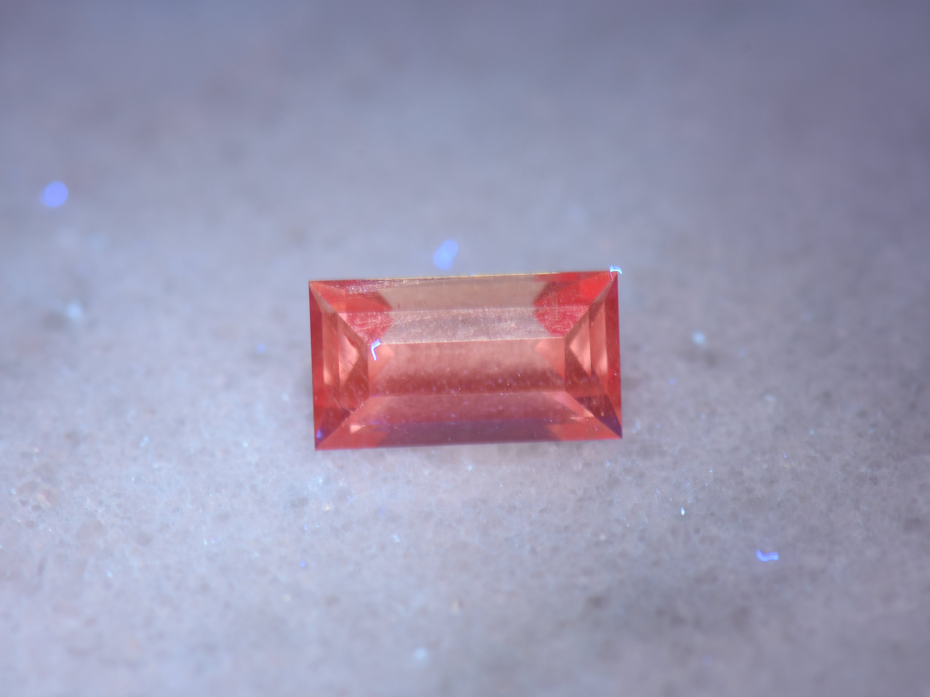 .89 ct. Fluorescent Malaya Garnet