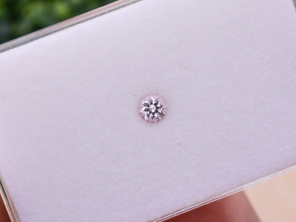 0.42 ct. Fluorescent Malaya Garnet