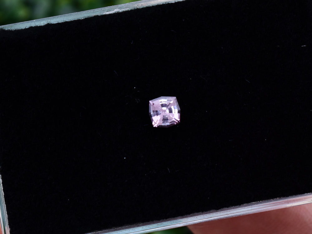 0.54 ct. Fluorescent Malaya Garnet