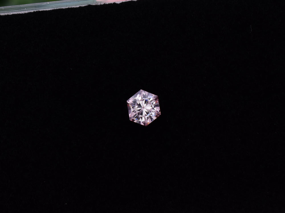 0.47 ct. Fluorescent Malaya Garnet