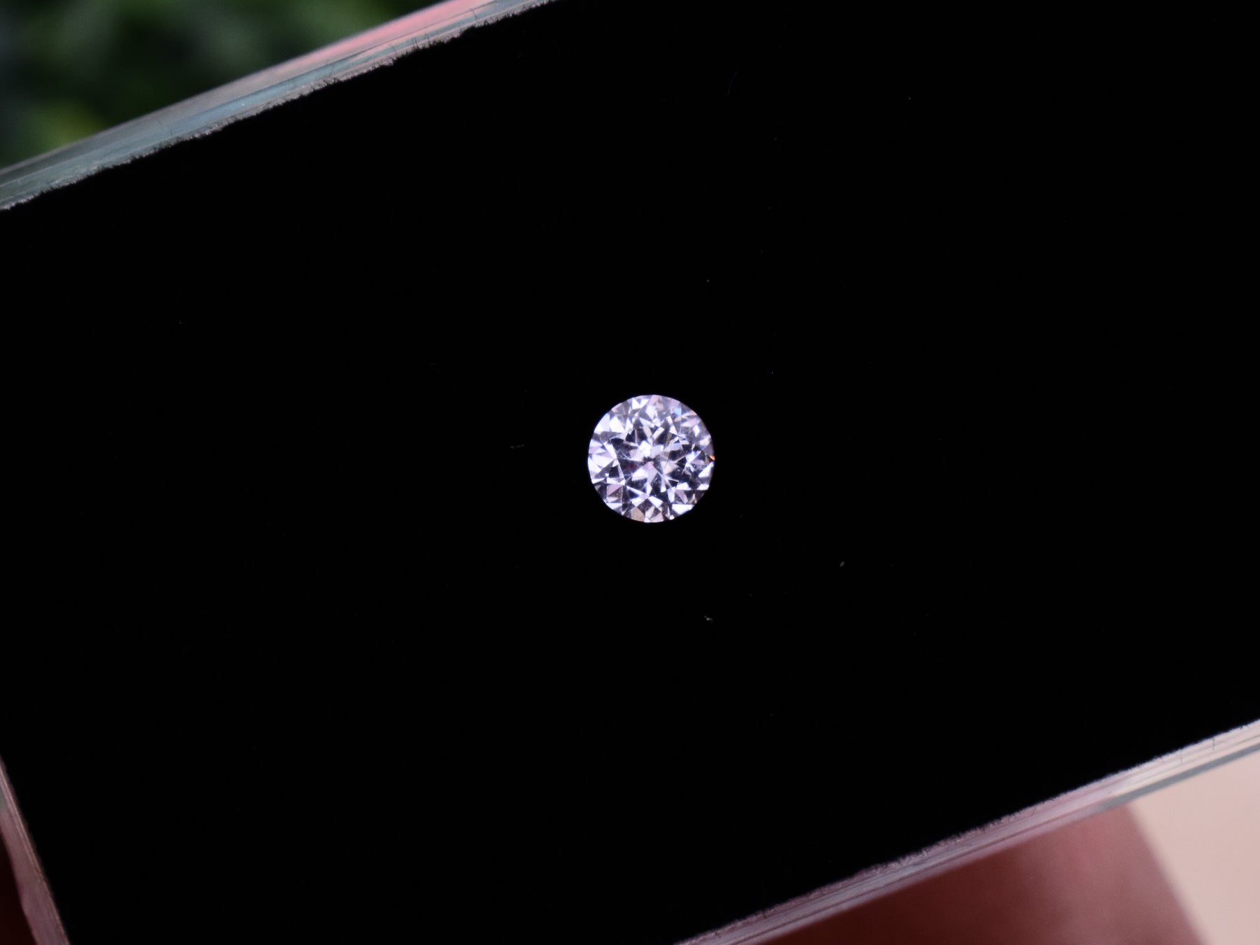 0.34 ct. Fluorescent Malaya Garnet