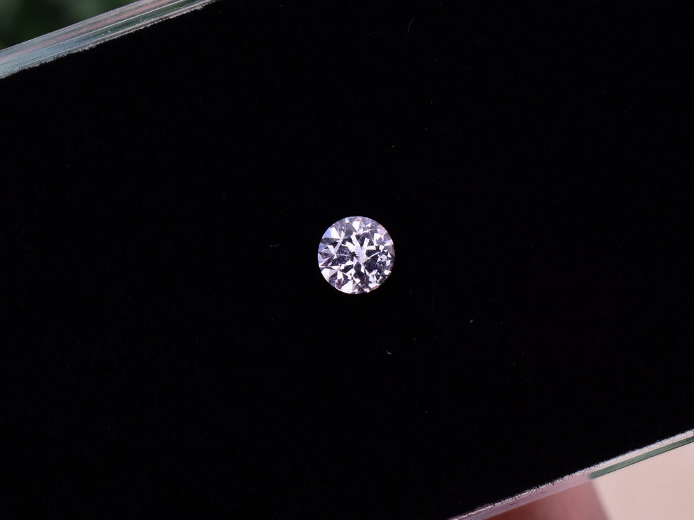 0.34 ct. Fluorescent Malaya Garnet
