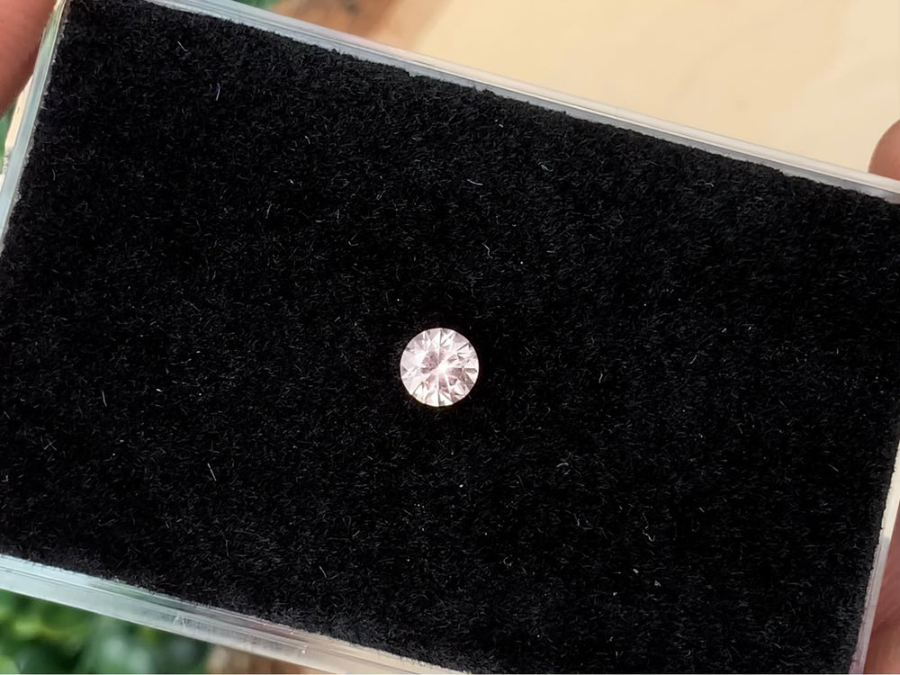 0.37 ct. Fluorescent Malaya Garnet