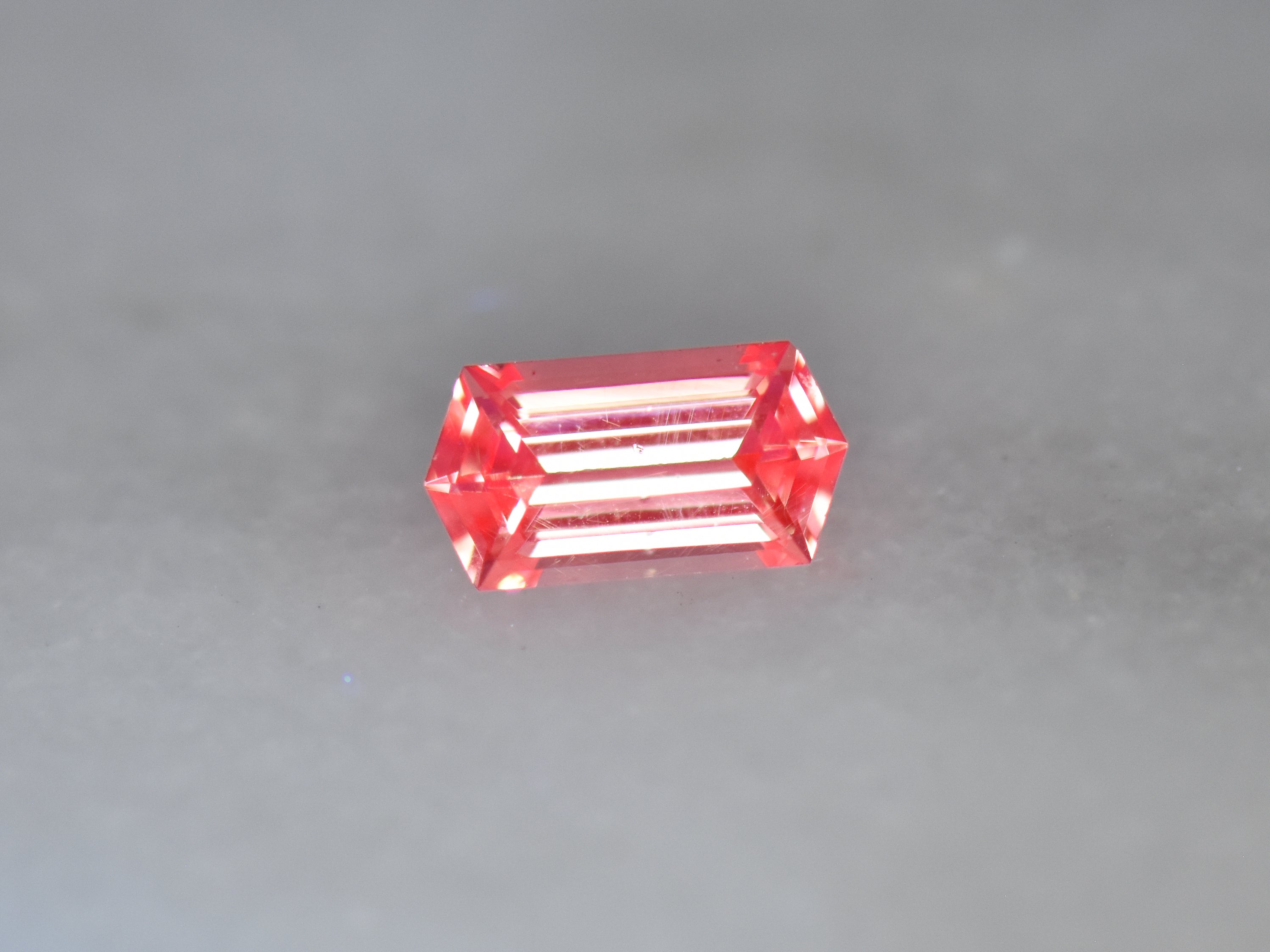 .75 ct. Fluorescent Malaya Garnet