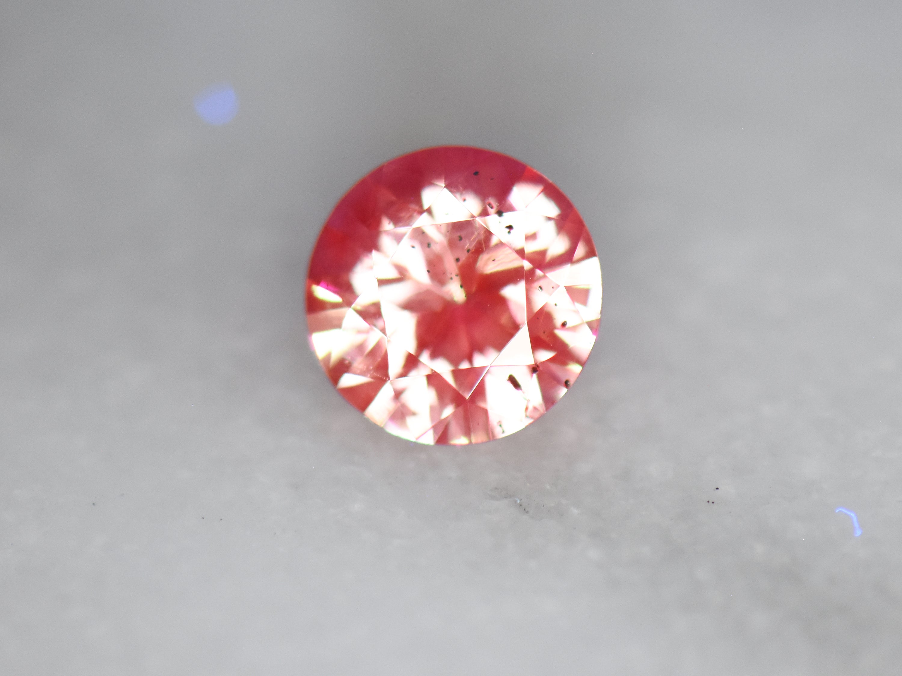 .77 ct. Fluorescent Malaya Garnet