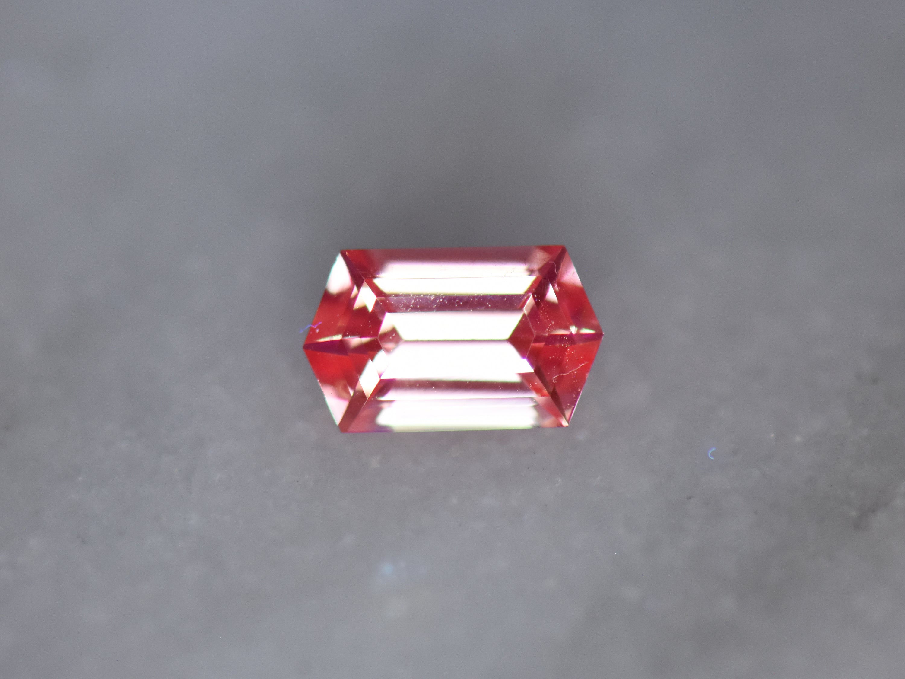 .65 ct. Fluorescent Malaya Garnet