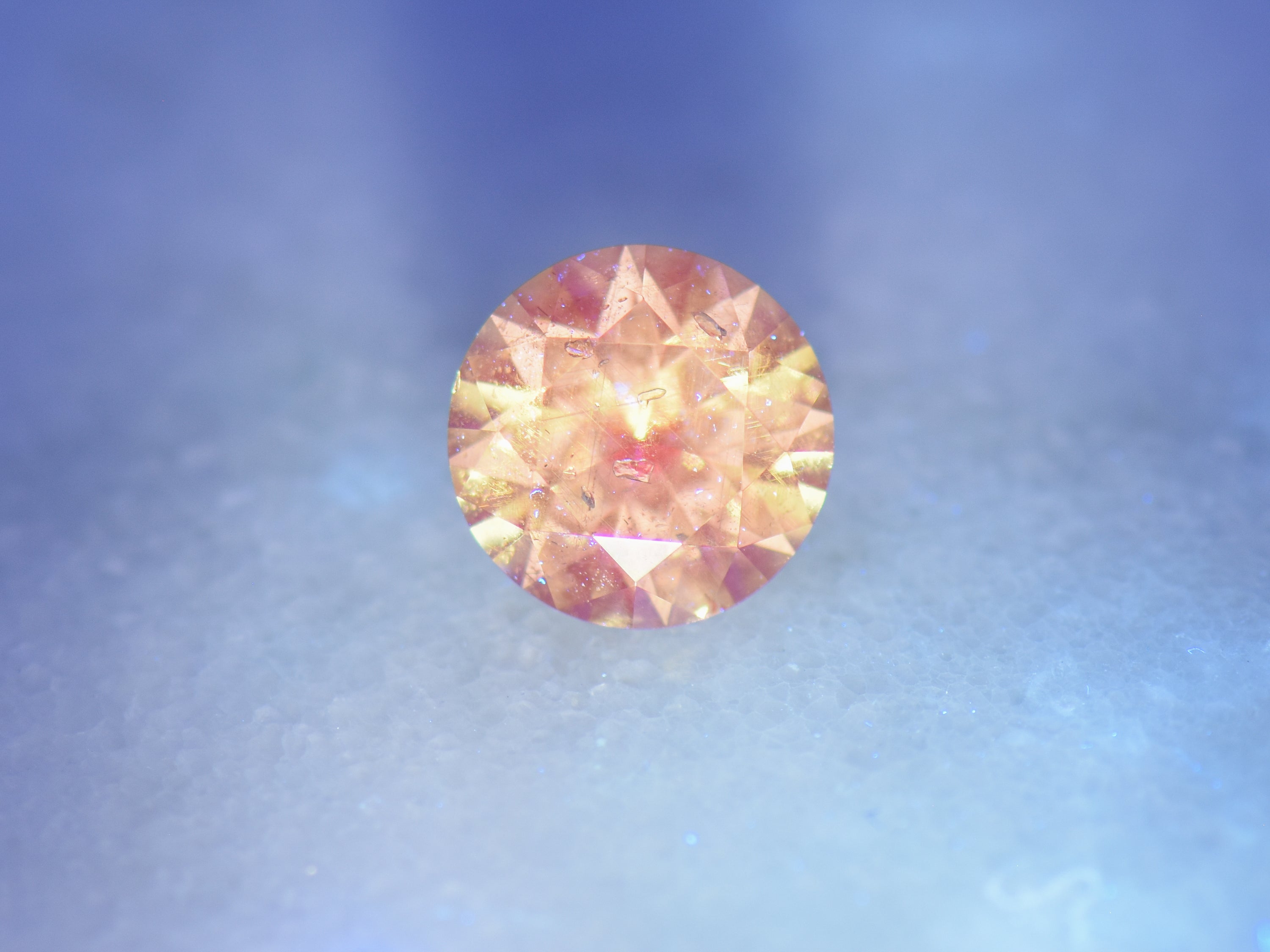 .69 ct. Fluorescent Malaya Garnet