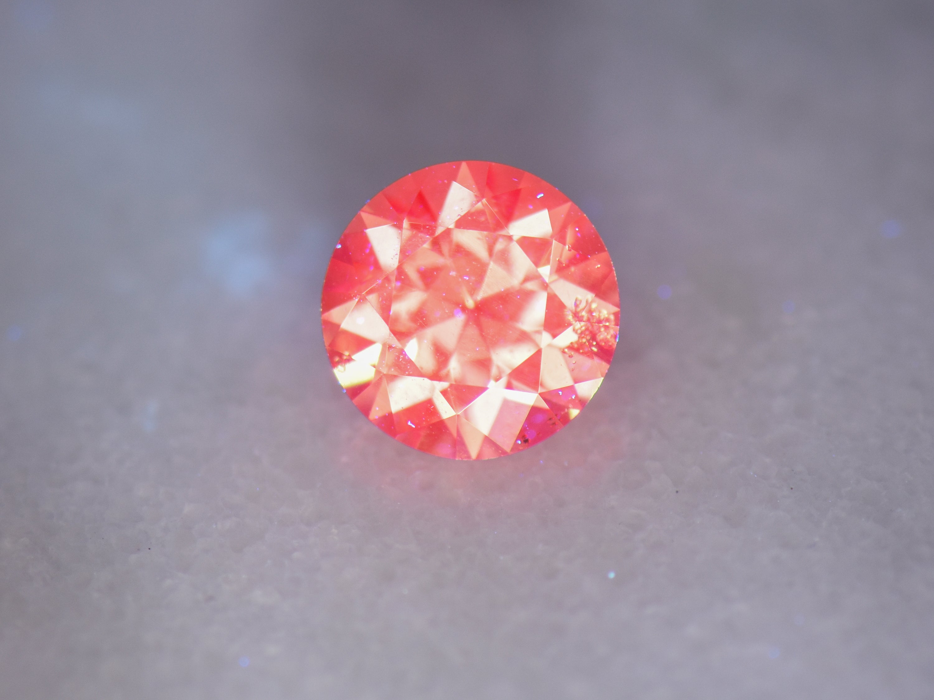 .61 ct. Fluorescent Malaya Garnet