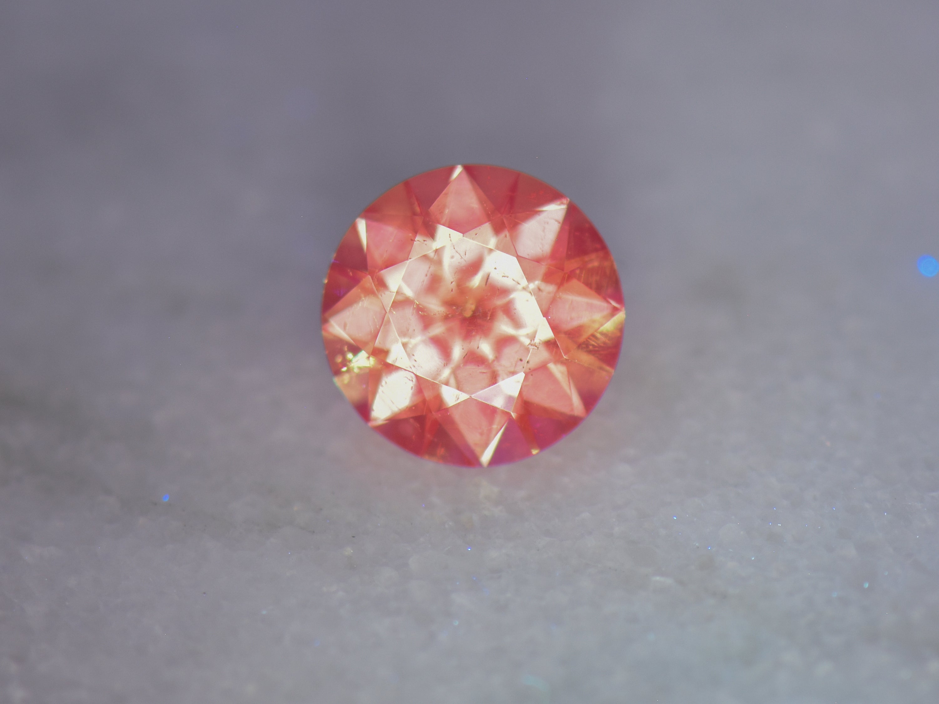 .56 ct. Fluorescent Malaya Garnet